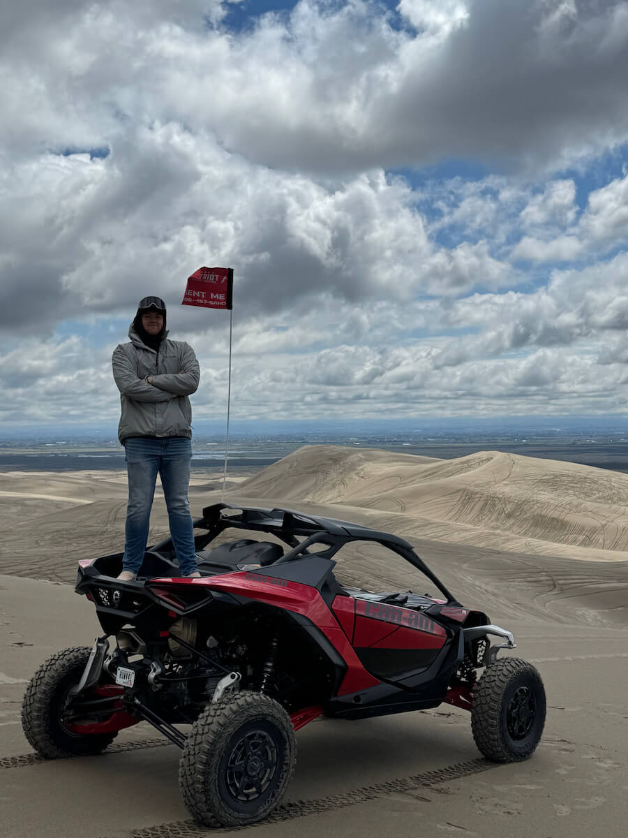 IMG_5802 UTV driver standing on top of UTV posing for photo