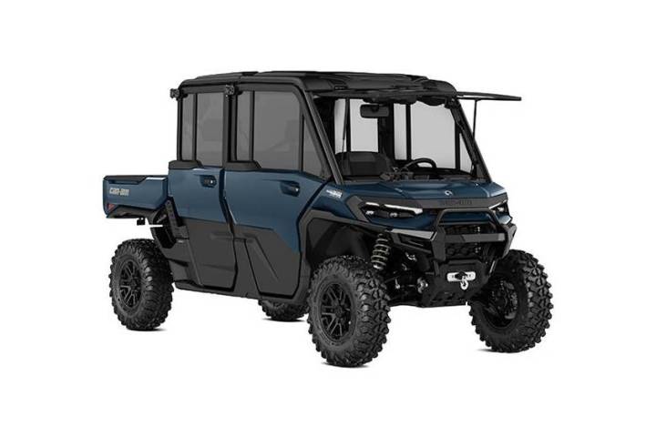 Black and blue utility vehicle with four large wheels on a white background.